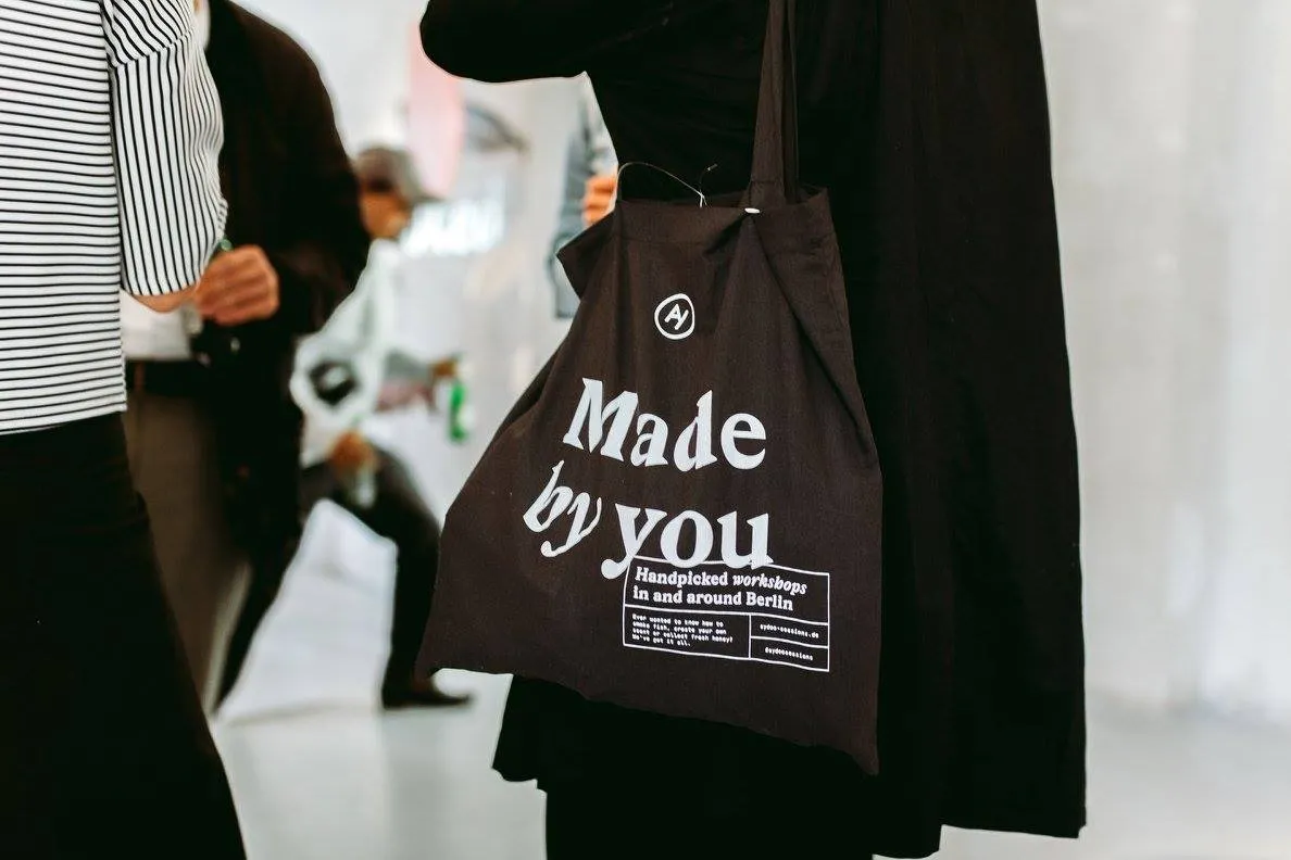 Impressions from opening party; a cotton bag.