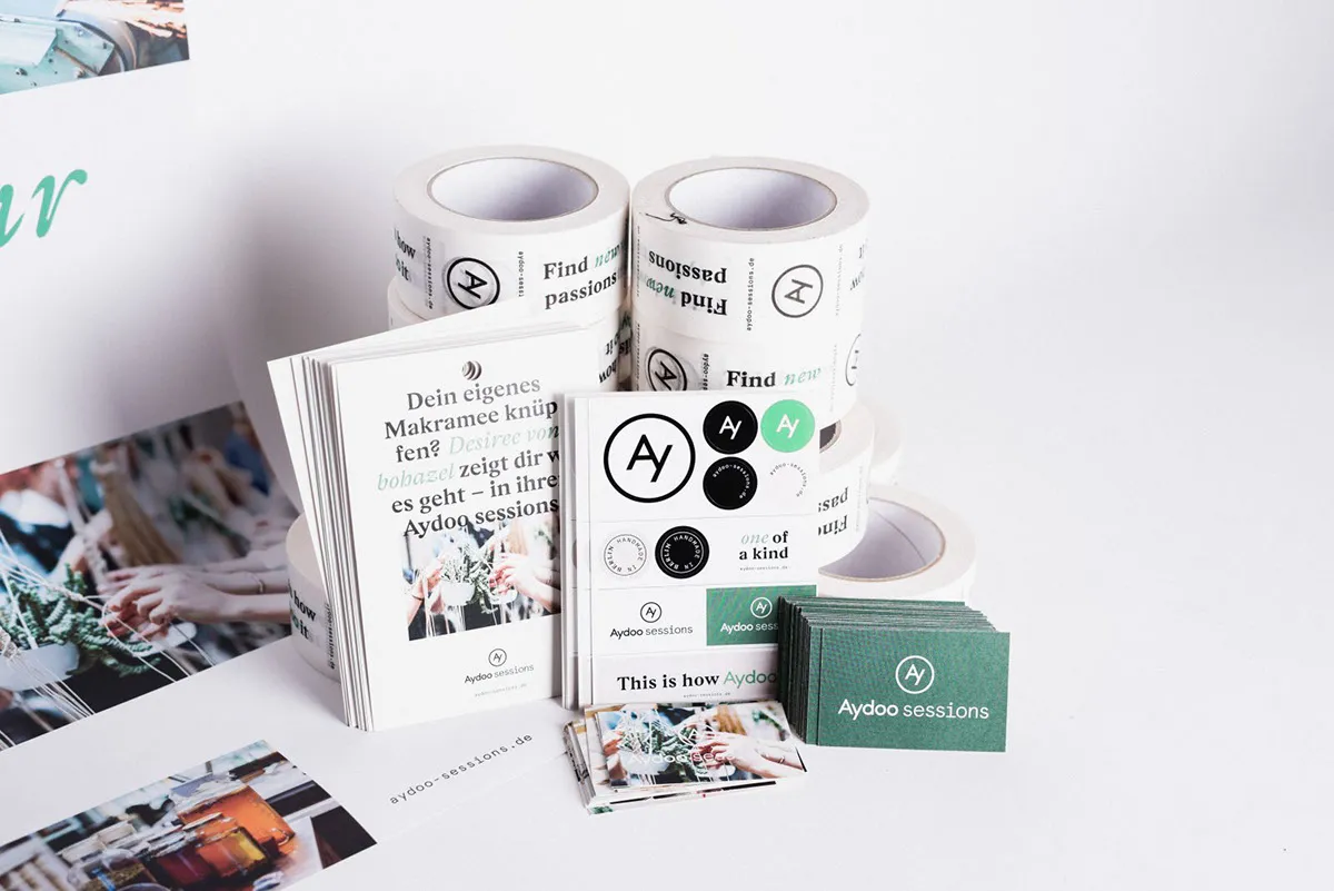 Press material like stickers, flyers and custom packing tape.