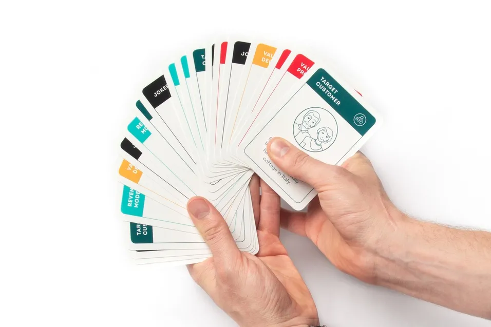 All the cards held in hands. Cards have different colors based on their category.