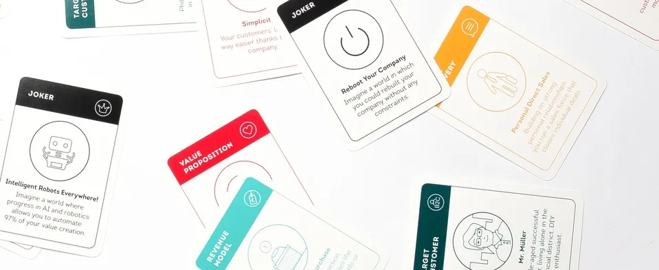 A card game with various cards from the game laying on a tablle.