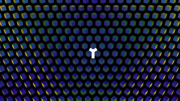 The letter T gets revealed in the white space between colorful cubes.
