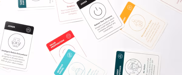 A card game with various cards from the game laying on a tablle.